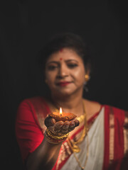 A Woman wearing red and white saree stock image.