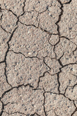 The texture of dried cracked mud flowed out of a mud volcano