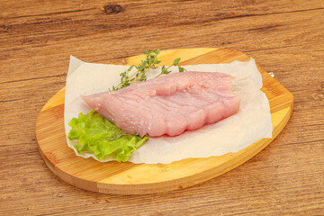 Raw turkey breast steak for cooking