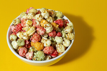 Homemade popcorn on on colorful backgrounds