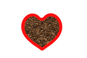 Milk thistle seeds in heart shape red frame isolated on white.
