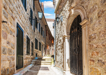 Fototapeta na wymiar Medieval street in the Old Town of Herceg Novi, Montenegro, no people