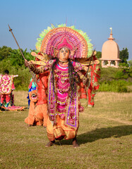A Chhau Dancer performing as Goddess Durga .