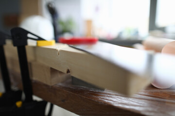 Building clamp at carpenter workspace