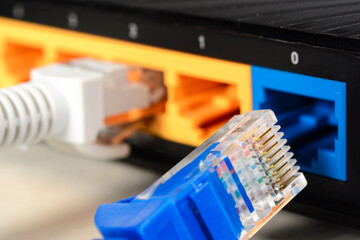 Home wi-fi router for internet connection with patch cords and two connectors. Concept home...