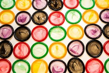 Colorful condoms background.