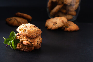 Food concept Homemade organic rustic butter cookies on black background with copy space