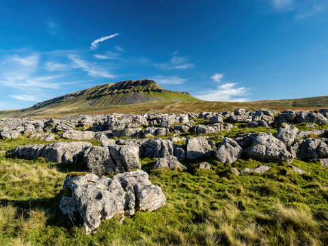 Limestone outcrop next to the mountain of Pen-y-ghent in the Yorkshire Dales National Park. At 2,277 feet, the mountain is one of the 'Three Peaks of Yorkshire'.
