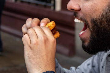 man eating a vegan dessert
