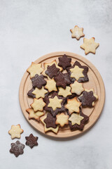 Star shape cookies on a grey background, shot from above