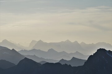 Mountain silhouette in the evening sun in the Swiss Alps