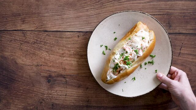 Serving a Lobster Roll Sandwich
