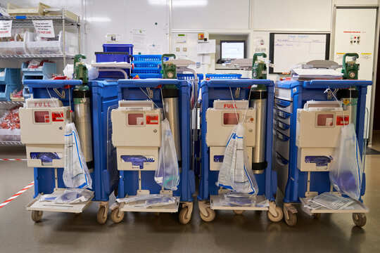Row of emergency hospital ventilator crash cart equipment
