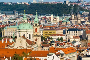 Foto op Plexiglas Prague, Czech republic - September 19, 2020. Famous towers above roofs  © marketanovakova