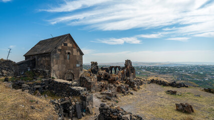 Fototapeta na wymiar Ruins of the Saint Sarkis monastic complex at Ushi, Armenia. The large monastery was built between 10th and 12th Century.