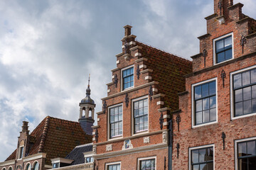 Top of the historic brick buildings of North Holland