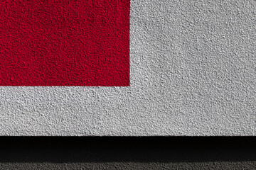 White wall with a red square. Wall of white plaster painted with a red square