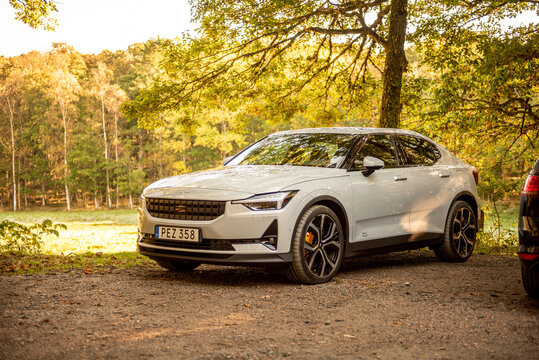 Mölndal, Sweden - October 17 2020: A white Polestar 2 by a park at fall..