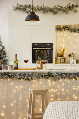 details of white modern kitchen background at christmas morning. new year christmas concept, free space