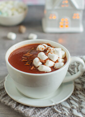 A cup of hot chocolate with marshmallows