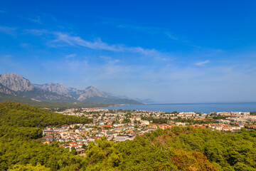 Fototapeta na wymiar View of Kemer town on a coast of the Mediterranean sea in Antalya province, Turkey. Turkish Riviera. View from a mountain