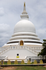 Unawatuna, Sri Lanka 15.4.2018 Japanese Peace Pagoda white temple against blue