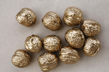 walnuts painted gold color for new year card