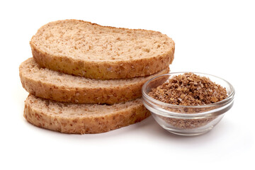 Slices of wheat bread and bran, healthy organic food, fitness, close-up, isolated on white background