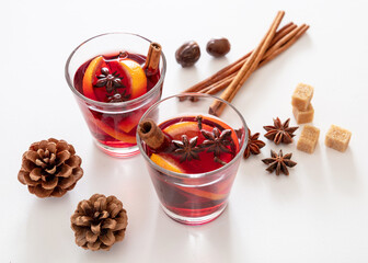 Mulled wine, Christmas hot drink in cups on white background