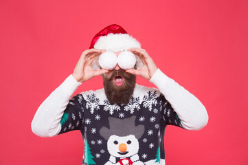 Look at that. buy new year tree decoration. happy new year. merry christmas. cheerful bearded man in santa hat and sweater. brutal hipster celebrate xmas party. winter holiday preparations