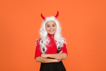 happy witch teenage girl with white hair wear costume horns of imp on halloween party, halloween costume party