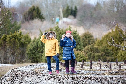 Children Left Without Adult Supervision Walking On Concrete Structure, Two Caucasian Sisters