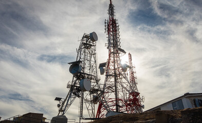 Different tipes of antennas, for communications like Radio, Tv or telephon mobile, in the top of a...