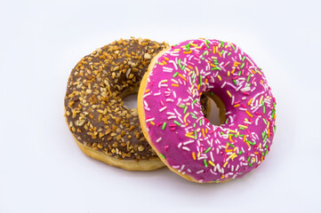 pink and brown doughnut, chocolate and berry doughnut, strawberry and raspberry doughnuts, walnut donut on a white background