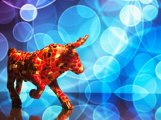 Bull, stylized figure on a blue background, symbol of 2021. There is free space for text on the photo.