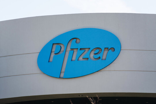 Pfizer logo on pharmaceutical corporation campus. Pfizer Inc. is a multinational pharmaceutical corporation headquartered in New York City - South San Francisco, CA, USA - 2020