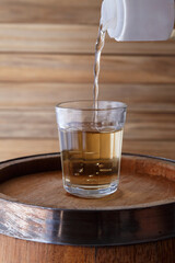 Cup of Cachaça or Pinga, a traditional Brazilian drink made from sugar cane.