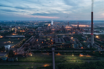 Industrial steel factory, iron works. Metallurgical plant. steelworks. Heavy industry in Europe, Poland, Dabrowa Gornicza. Air pollution from chimneys. Ecology and environmental. Aerial drone view