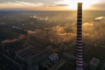 Industrial steel factory, iron works. Metallurgical plant. steelworks. Heavy industry in Europe, Poland, Dabrowa Gornicza. Air pollution from chimneys. Ecology and environmental. Aerial drone view
