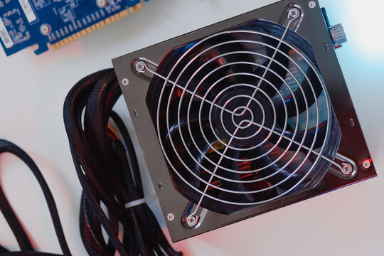 Power supply Electronics technology concept white background details blue red light