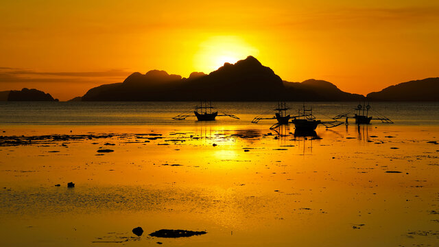 four boats in the ocean