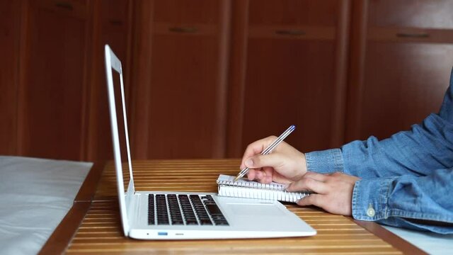 Man doing an online course. Concept of online classes and e-learning.