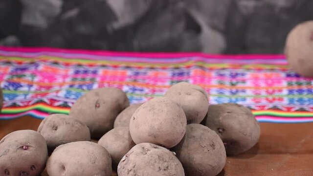 potato falling in slow motion with colored blanket