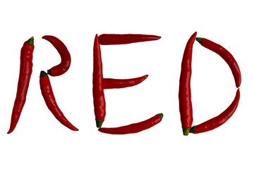 The word RED is lined with hot red pepper pods isolated on a white background. A few fresh red pepper pods. Red chili pepper on a white background.