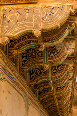 A close up of fresco decorated cantilevers on an Havelis in Mandawa, Rajasthan, India