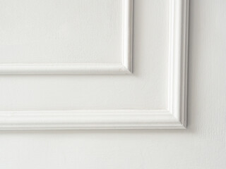 Beautiful ornate white decorative mouldings in studio. Decorative stucco in the classic interior of...