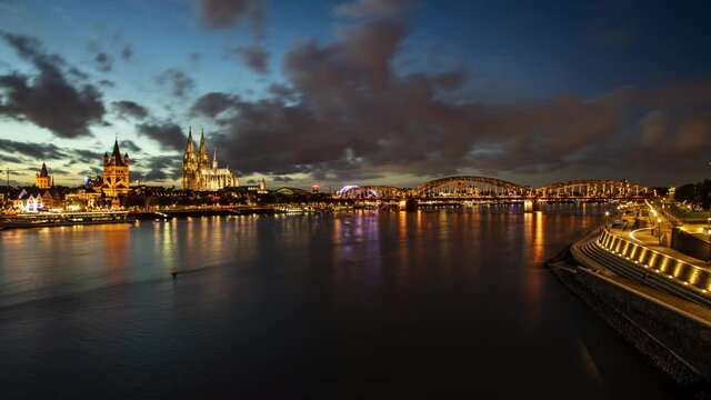 Time lapse night view of Cologne cathedral and Rhine river