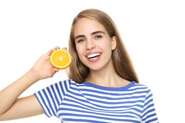 Young girl holding fresh orange fruit on white background