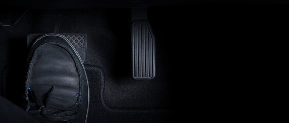 Close up images of man driving car by pushing accelerator and brake pedal with right foot black...