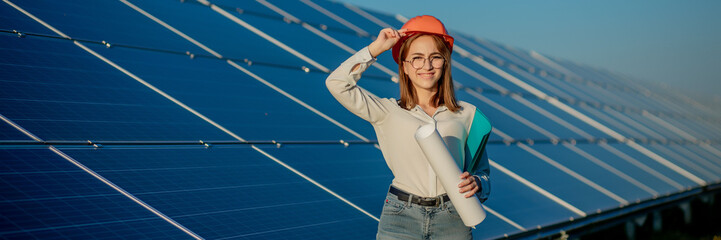 Businesswomen working on checking equipment at solar power plant with tablet checklist, woman...